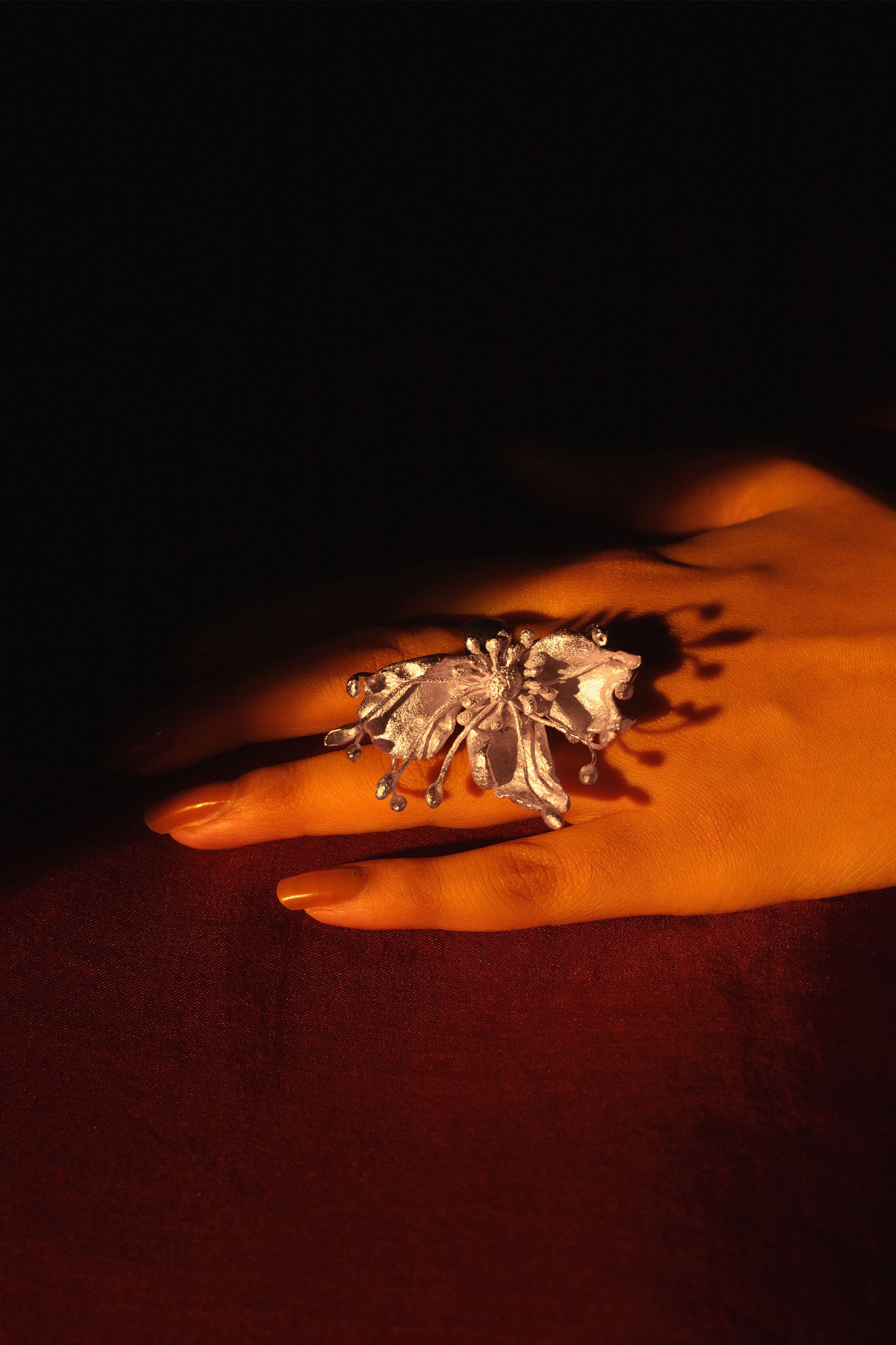 Model closeup hand shot wearing silver ring